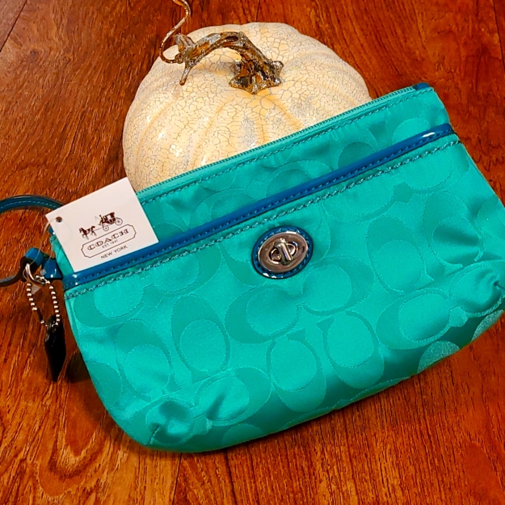 Coach beautiful green wristlet.